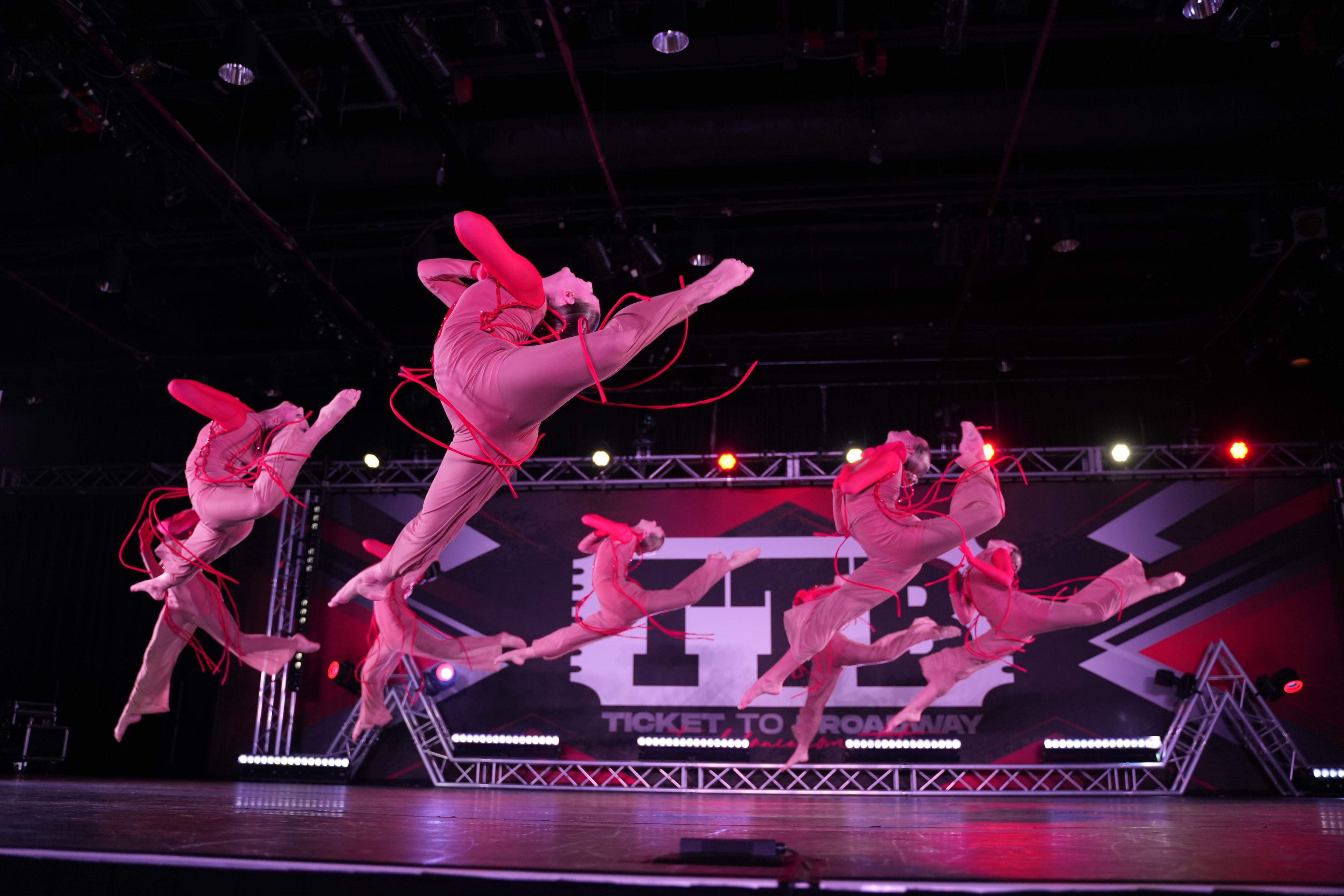 CaRu Entertainment dancers performing on stage