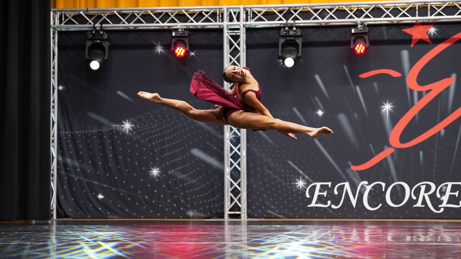 CaRu Entertainment dancer leap at Encore DCS